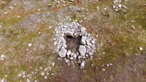A small hole in the ground with water in it Stock Footage 331357738