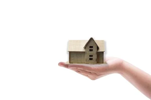 Small home model on hand white background Stock Photos