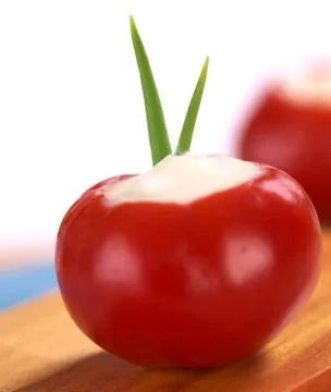 Small hot red pepper filled with sour cream Stock Photos