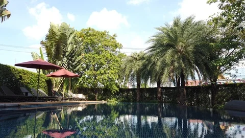 Small hotel resort pool area with no people Video stock 107351865