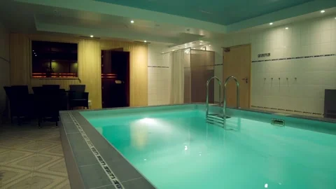 Small Hotel SPA Center with Pool, Shower, Sauna and Relaxation Corner. Stock Footage 306400924