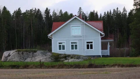Small house near the forest, surrounded by trees, nature. Stock Footage 321744595