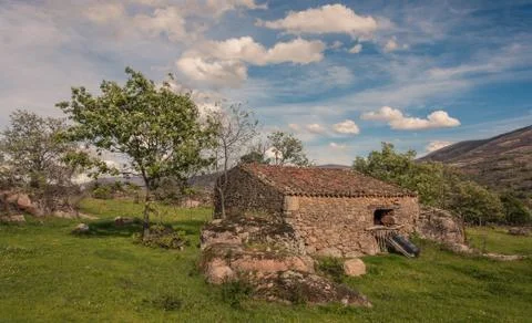 Small house of stone Stock Photos