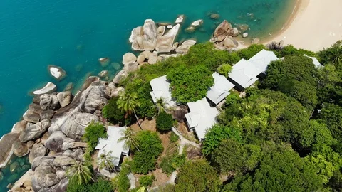 Small houses on tropical island. Tiny cozy bungalows located on shore of Koh Stock Footage 110623278