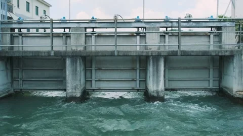 Small hydraulic structure with electric power station on the river in Piedmont Stock Footage 264166215