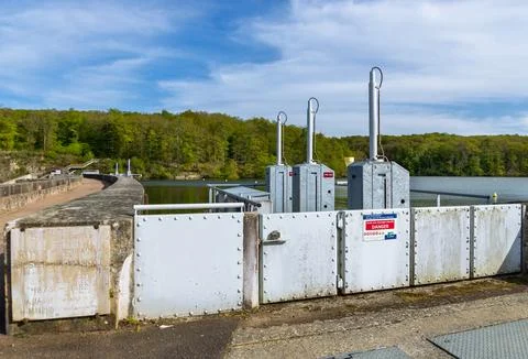 Small hydroelectric generators installed on a water dam in Pont-du-Casse. Stock Photos
