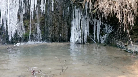 A small ice covered waterfall1 Stock Footage 127089605