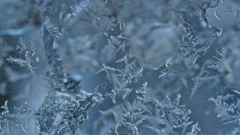 Small Ice Crystals Structures on Glass Surface Macro Stock Footage 258076546