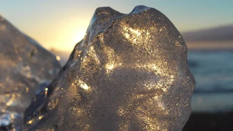 Small Iceberg On Diamond Beach During Sunset Stock Footage 233450999