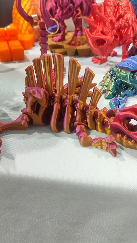 Small ichthyosaurus skeleton printed 3D printer molten plastic pink Vertical Stock Footage 303956125