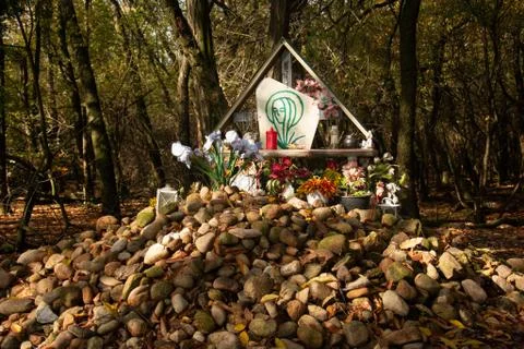 Small improvised altar in the woods Stock Photos