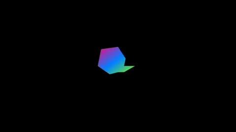 A small iridescent geometric shape floating in a deep black background field Video stock 335118002