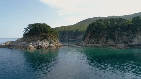 The small island in the emerald bay. The Far East. Stock Footage 115794516