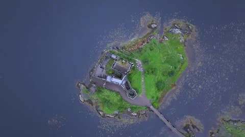 A small island with a house on it Stock Footage 306619683