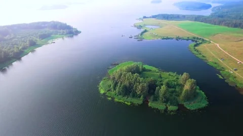 Small island in lake Stock Footage