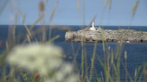 Small island with lighthouse Stock Footage 54082260