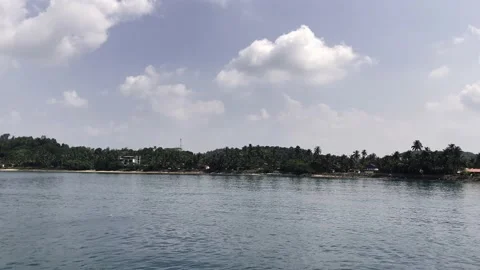 Small islands in the open ocean shooting from a boat Stock Footage 219476146