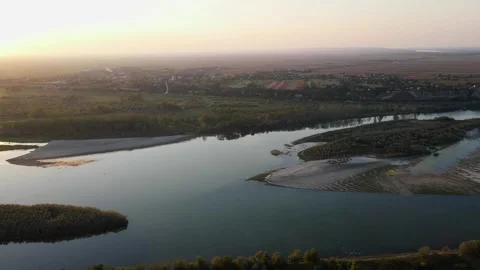 Small islands in river Danube in a sunset captured with drone Stock Footage 258954346