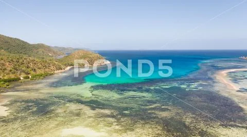Small islands with a sand bar. Malay Archipelago, Philippines. Stock Photos