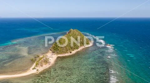 Small islands with a sand bar. Malay Archipelago, Philippines. Stock Photos