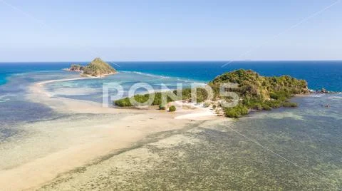 Small islands with a sand bar. Malay Archipelago, Philippines. Stock Photos