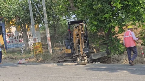 Small JCB Handling Big Tasks with Ease Stock Footage 313571530