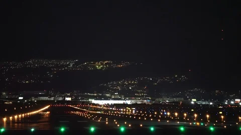 Small jet plane landing scene in the night. Video stock 104099736
