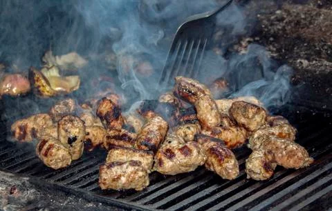 Small kebabs  grilled in a mobile kitchen. Stock Photos