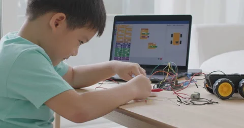 Small kid children make coding scratch car upskill STEAM lifestyle. Stock Footage 164395630