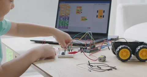 Small kid children make coding scratch car upskill STEAM lifestyle. Stock Footage 164395954