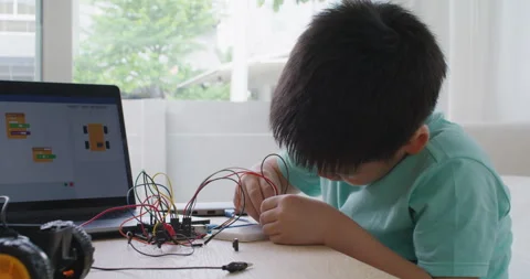 Small kid children make coding scratch car upskill STEAM lifestyle. Stock Footage 168182471
