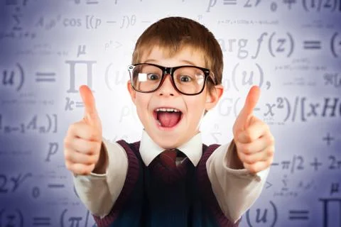 Small kid in glasses on the formulas background Foto stock