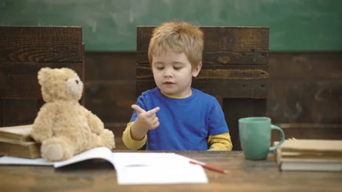 Small kid learning to count. Adding numbers with hands. Math lesson at Stock Footage 106262450
