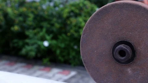 Small knife sharpening on grinding wheel Stock Footage 116983393