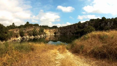 SMALL LAKE BETWEEN MOUNTAINS Stock Footage 93520567