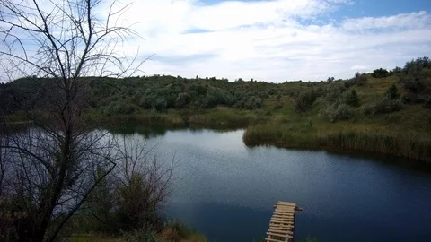 A small lake with clear water Stock Footage 90968079