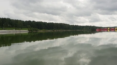 Small lake. Forest on the shore. Reflection Stock Footage 115333513