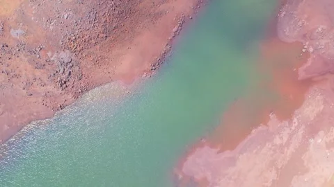 Small lake on hilly area Stock Footage 280469545