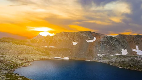 Small lake in mountain valley at the sunset time lapse scene 스톡 동영상 239744668