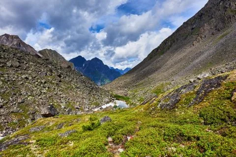 Small lake in mountains Stock Photos