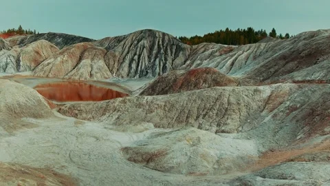 Small lake in the red mountains Stock Footage 141151053