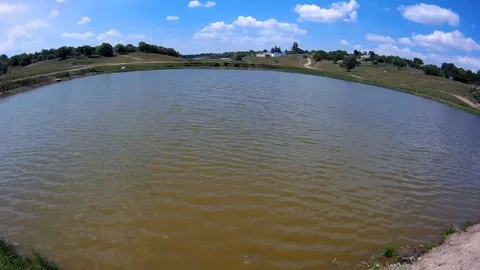 Small lake with small waves Stock Footage 90904093