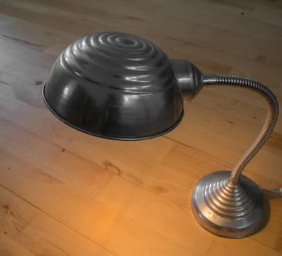 Small lamp on a floor Stock Photos