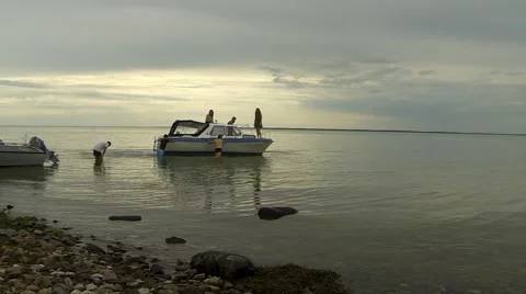 Small launch departure on Baltic coast Stock Footage 53000128