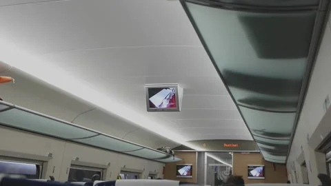 A small LCD TV screen inside a high-speed train compartment 스톡 동영상 148307210
