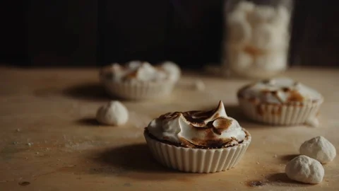 Small lemon curd cake with meringue burnt with a gas torch Stock Footage 96111208