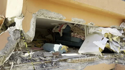 The small life gap formed in the house destroyed in the earthquake Stock Footage 246463341
