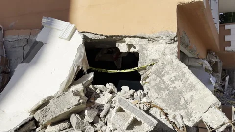 The small life gap formed in the house destroyed in the earthquake Stock Footage 246470177