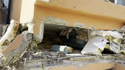 The small life gap formed in the house destroyed in the earthquake Stock Footage 246505359