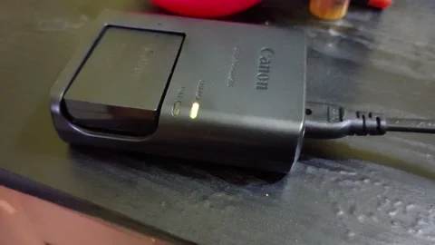 Small light as a indicator that the battery is charging or full Stock Footage 237486288